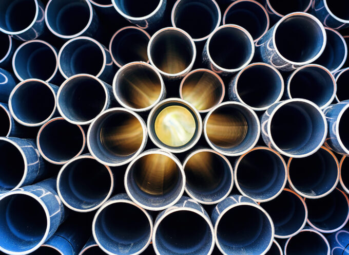 abstract pattern of aged pvc pipe with sun lights